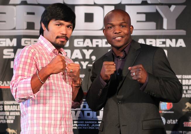 WBO welterweight champion Manny Pacquiao, left, and undefeated WBO junior welterweight champion Timothy Bradley Jr. pose during a press conference in New York City Thursday during a cross-country media tour for their upcoming welterweight title fight. Pacquiao vs Bradley will take place June 9 at the MGM Grand Grand Garden Arena in Las Vegas.